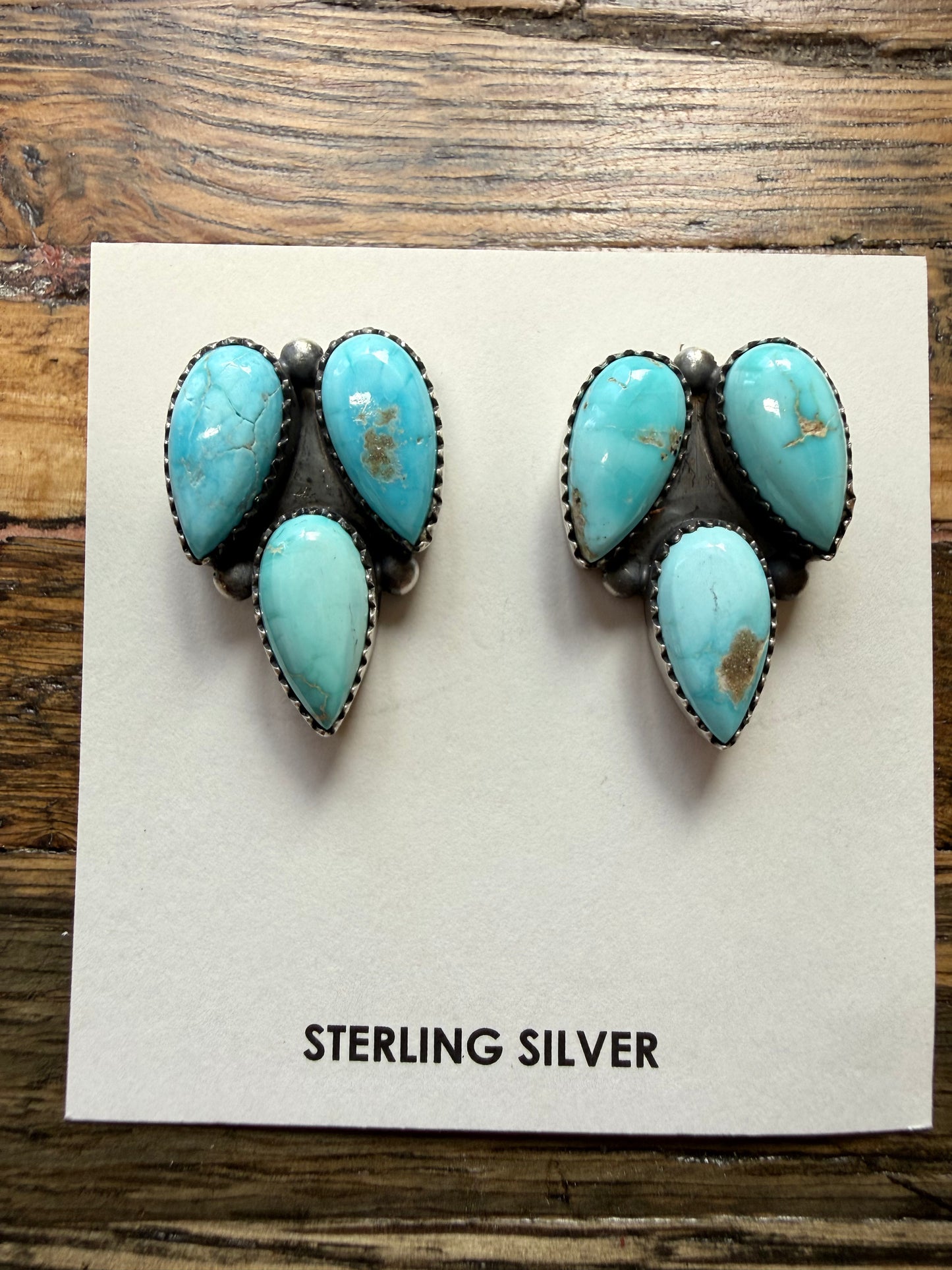 Native American: three stone teardrop turquoise post earrings $200