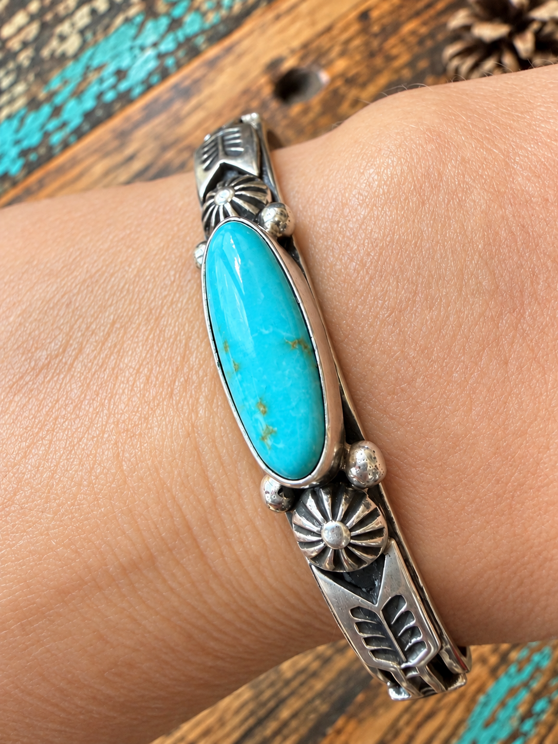 Native American: single stone, long oval, turquoise, and sterling silver bracelet $600